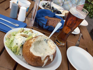 clam chowder served in a sourdough bread bowl